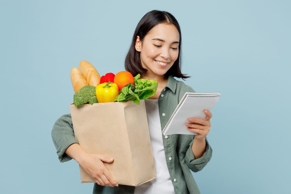 Woman following the best meal planning tips for a busy lifestyle