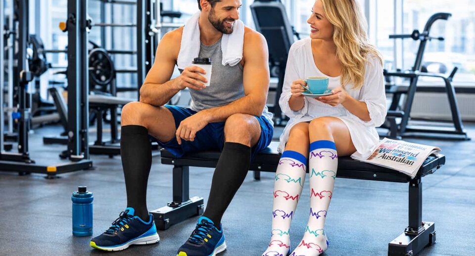 Man and woman wearing compression socks to reduce leg fatigue and support better blood circulation.